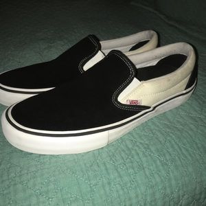 Black and white slip on Pro Vans